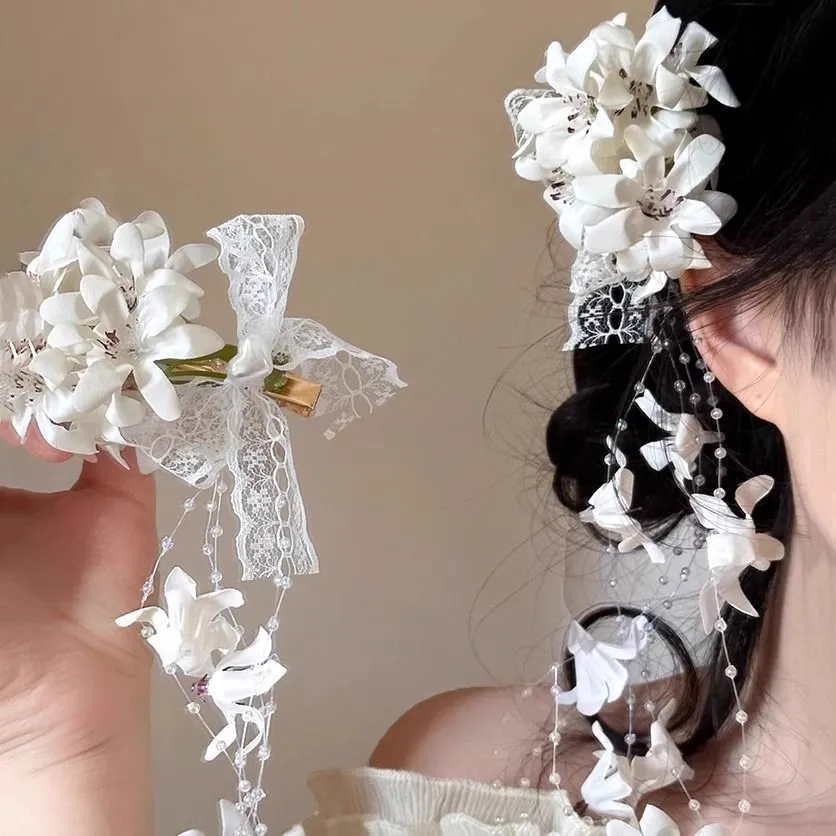 Women Fashion Photoshoot - Elegant White Floral Hair Clip with